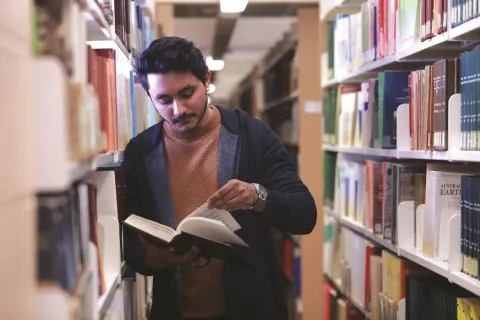 Library Patron Reading a Book