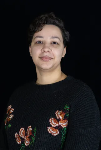 Headshot of Asha Chiraghdin
